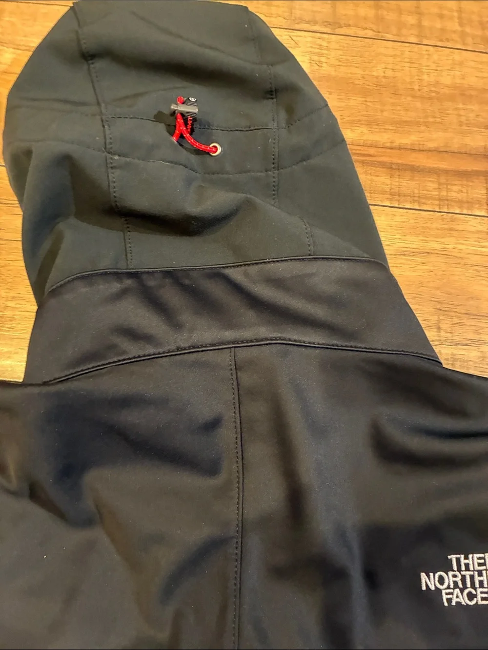 The North Face Black Hooded Windbreaker Windstopper with Red Zipper Accents
